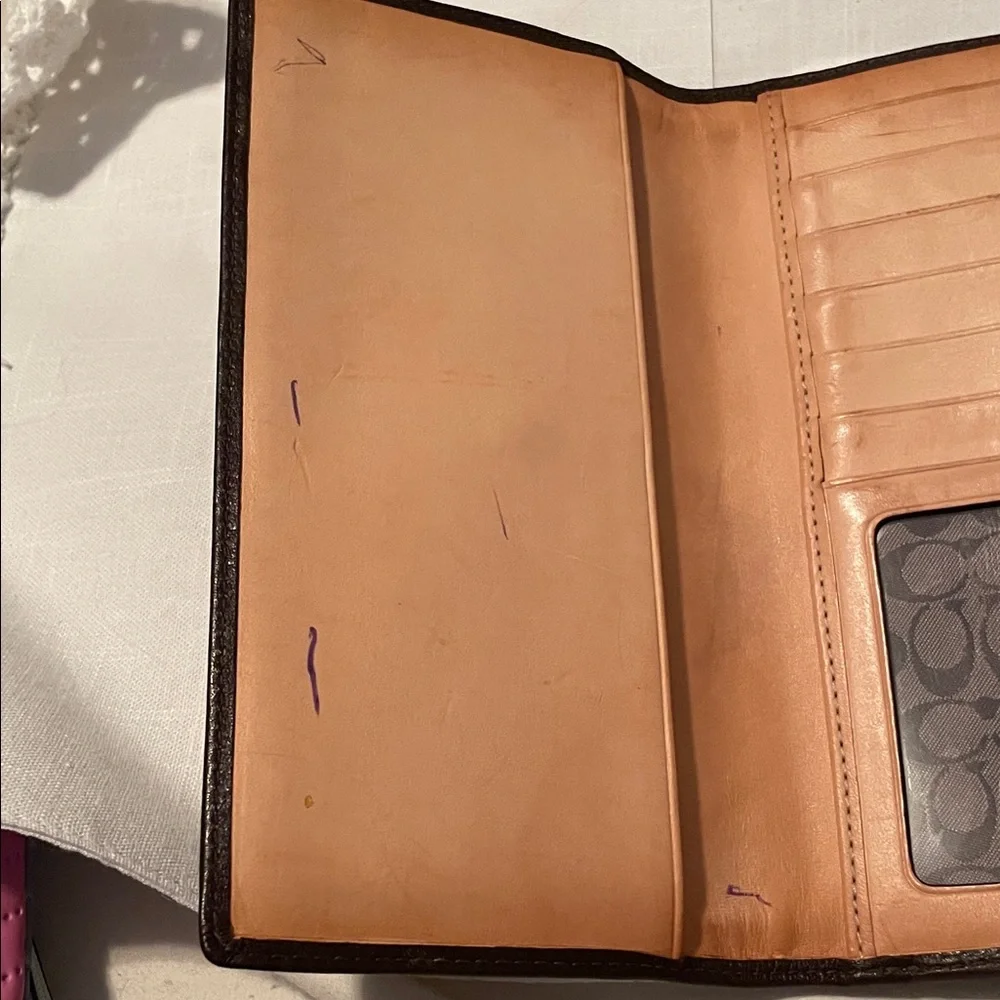 Coach triple wallet. EUC few call outs on inside.